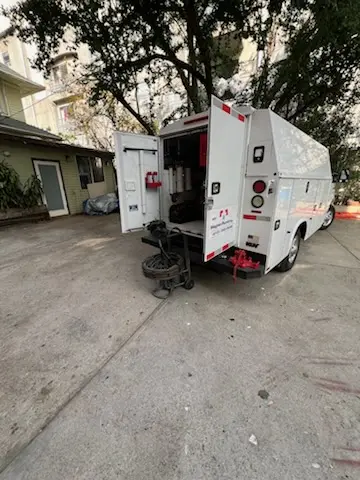 Magnet Plumbing service vehicle on-site for Water Heater Repair in Lakeland